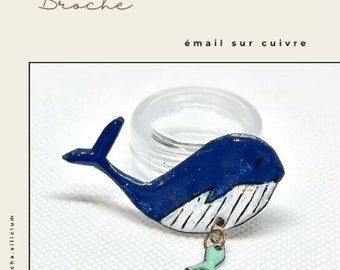 Enamel brooch on copper whale and small fish