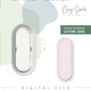 Puede incluir: Dos cortadores de galletas ovalados, uno blanco y otro rosa claro. El cortador blanco tiene un borde de corte de 0,3 mm y 0,4 mm. El texto "Clay Spark Digital" y "0.3mm & 0.4mm CUTTING EDGE" es visible en la imagen.