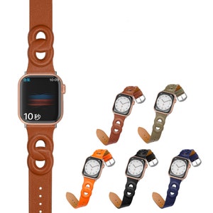 Könnte beinhalten: Fünf Apple Watch Armbänder mit einem Doppel-Schlaufen-Design. Die Armbänder sind aus braunem, grünem, orangefarbenem, schwarzem und blauem Leder.