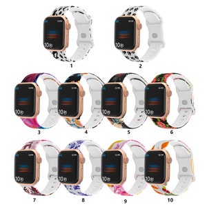 May include: Ten different Apple Watch bands with various colorful floral and animal print designs. The bands are made of silicone and have a white buckle.