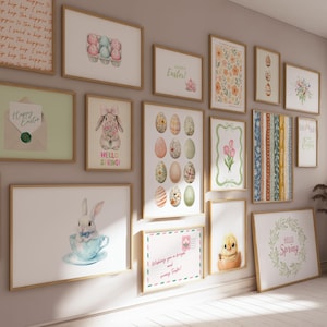 May include: A collection of framed art prints with Easter and spring themes. The prints feature watercolor illustrations of eggs, bunnies, flowers, and seasonal greetings. The frames are a light brown color, and the overall aesthetic is soft and pastel.