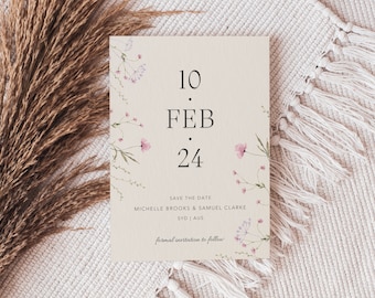 May include: A save the date card with a floral design. The card is beige with pink flowers and green leaves. The text on the card reads "10 FEB 24" and "SAVE THE DATE MICHELLE BROOKS & SAMUEL CLARKE SYD | AUS formal invitation to follow".