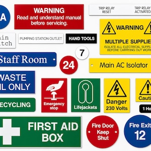 May include: A collection of various industrial safety signs in red, blue, green, yellow, black, and white. The signs feature text including Warning, Main Switch, Staff Room, Waste Oil Only, Recycling, Emergency Stop, Lifejackets, Danger 230 Volts, and First Aid Box.