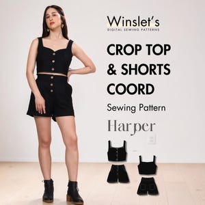 May include: A black crop top and shorts set with button details. The image includes the text "Crop Top & Shorts Coord Sewing Pattern Harper" and a logo for Winslet's Digital Sewing Patterns. The model is wearing black boots.