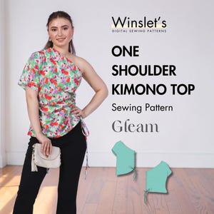 May include: One-shoulder kimono top sewing pattern with floral print. The image shows a woman wearing a floral top with black pants. The text on the image says "One Shoulder Kimono Top Sewing Pattern Gleam".