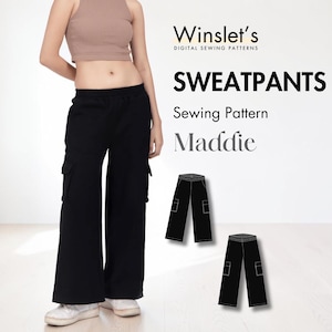 May include: Black sweatpants with cargo pockets, part of a sewing pattern called "Maddie" by Winslet's Digital Sewing Patterns. The image also shows a person wearing the pants and a tan crop top.
