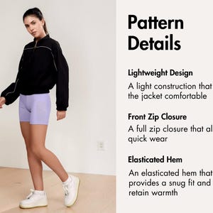 Pode incluir: Uma pessoa vestindo uma jaqueta preta com detalhes brancos e shorts roxos claros. A jaqueta tem fecho de z&iacute;per frontal e bainha el&aacute;stica. O texto &agrave; direita diz "Pattern Details" e descreve as caracter&iacute;sticas da jaqueta.