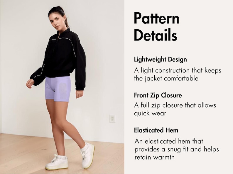 Pode incluir: Uma pessoa vestindo uma jaqueta preta com detalhes brancos e shorts roxos claros. A jaqueta tem fecho de z&iacute;per frontal e bainha el&aacute;stica. O texto &agrave; direita diz "Pattern Details" e descreve as caracter&iacute;sticas da jaqueta.