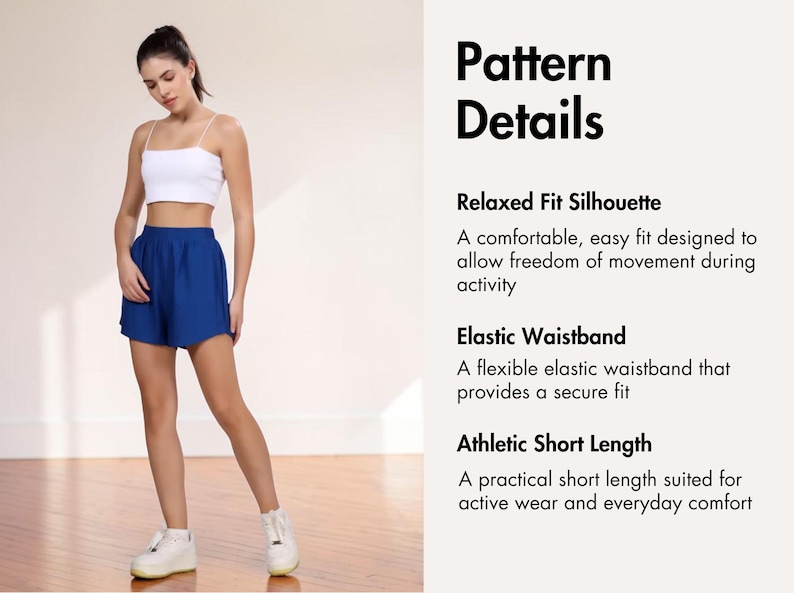 May include: A woman wearing a white crop top and blue athletic shorts. The shorts have an elastic waistband and a relaxed fit. The image includes text that says "Pattern Details".