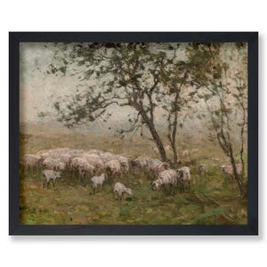 May include: Framed artwork depicting a pastoral scene with a flock of sheep grazing in a field under the shade of trees. The painting has a muted color palette of greens, browns, and whites, with a black frame.