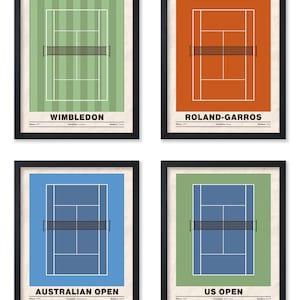 May include: Four framed tennis court prints. Each print features a different court: Wimbledon, Roland-Garros, Australian Open, and US Open. The courts are depicted in green, orange, blue, and green, with black frames and white text.