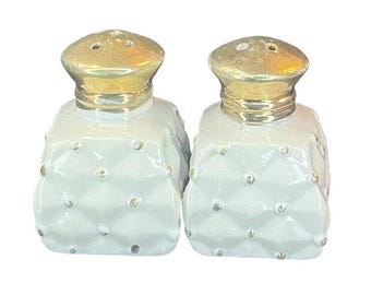 Salero y pimentero Ardalt Japan, color blanco y dorado, con cojín acolchado, estilo vintage.