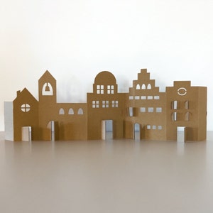 Casitas de cartón para decorar en Navidad.