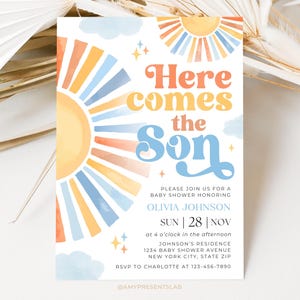 Pode incluir: Um convite para chá de bebê com um design de sol em aquarela em laranja, amarelo e azul. O texto "Here comes the Son" é exibido em uma fonte retrô. Os detalhes incluem o nome do homenageado, a data, a hora e o local.