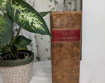 Biblia antigua del siglo XIX, con lomo de cuero, en muy buen estado.