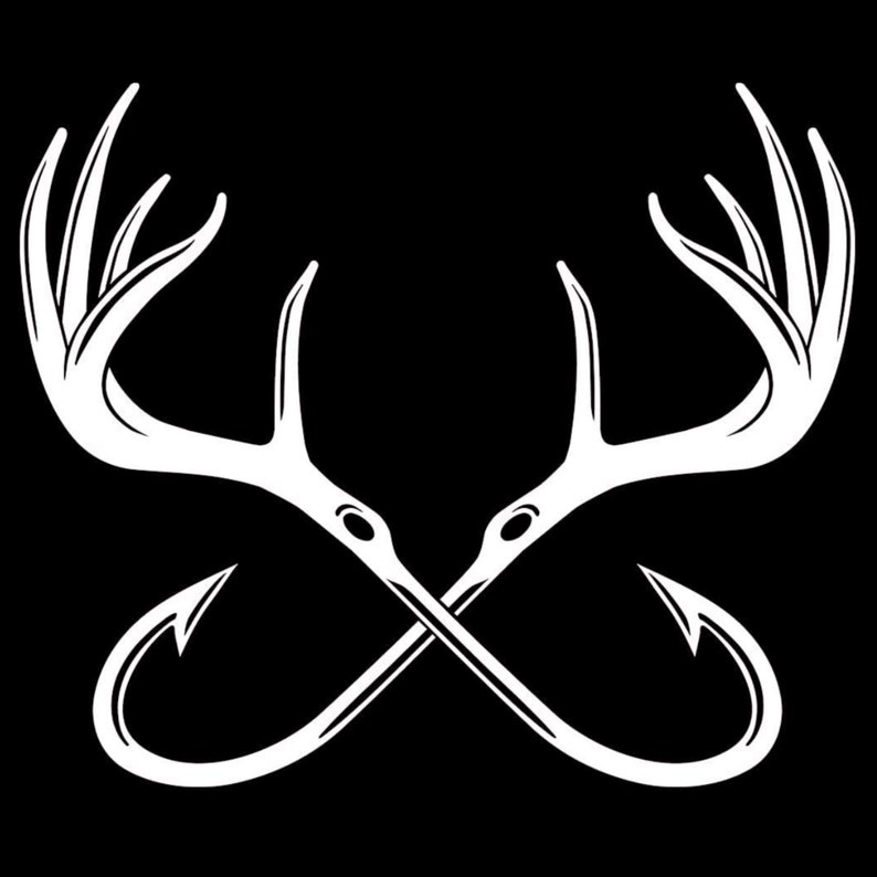 May include: A white graphic illustration on a black background featuring two crossed fishing hooks that transition into deer antlers. The design is symmetrical, with the sharp points of the hooks facing outward and the antler tines pointing upward.