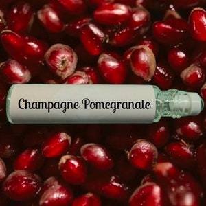 Champagne Pomegranate Perfume - sparkling blend of citrus, pomegranate, strawberries, raspberries, and champagne