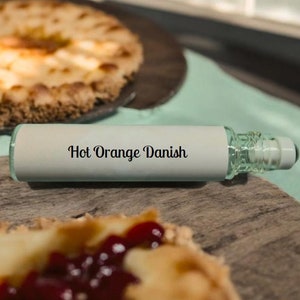 Hot Orange Danish Perfume - orange zest, clementines, churned butter, cinnamon, milk, vanilla pods, and drizzled cream frosting