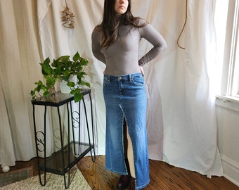 Reconstructed, one-of-a-kind denim maxi skirt size 6/28waist.  Handmade from repurposed jeans.