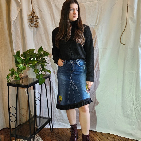 Reconstructed, one-of-a-kind denim skirt size 6/28waist.  Handmade from repurposed jeans.