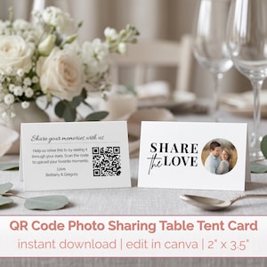 May include: Two white table tent cards. One card reads "Share your memories with us" and includes a QR code. The other card says "Share the Love" and features a photo. The cards are 2" x 3.5".