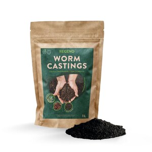 May include: A brown paper bag with a green label that says "REGENO WORM CASTINGS Odorless Plant Probiotic & Soil Conditioner 1L". The label has a picture of hands holding soil.