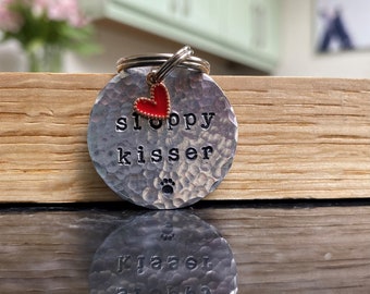 Custom Pet Tag – 'Sloppy Kisser' Hand stamped, hammered brass tag with coloured heart charm - Dog Tag - Funny pet tag. Funny Dog Tag - UK