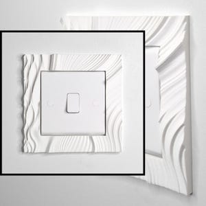 May include: A white light switch plate cover featuring a textured, wavy, and rippled relief pattern surrounding a central square switch. The design consists of smooth, flowing lines that create a three-dimensional effect on the rectangular frame.