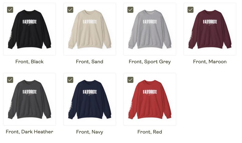 May include: A selection of crew neck sweatshirts in colours such as black, sand, sport grey, maroon, dark heather, navy, and red. Each sweatshirt displays the word "FAVORITE" in white block letters on the front and a design on the left sleeve.