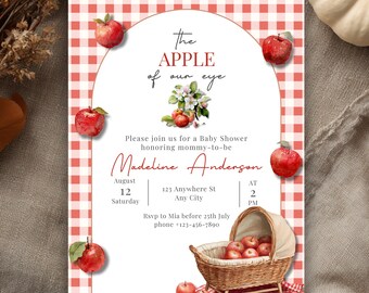 May include: Baby shower invitation with a red and white gingham pattern. The invitation features the text "The Apple of our Eye" and details for the event, including the date, time, and location. Decorative red apples are scattered around the design.