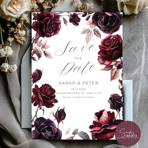 May include: A white invitation card with burgundy roses and leaves. The text "Save the Date" is in elegant script, with details for Sarah & Peter, and the date 26.11.2024. A floral design frames the text.