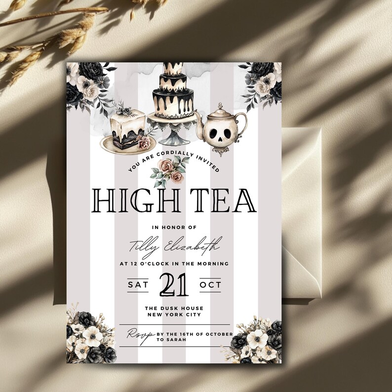 May include: High tea invitation with a watercolor design. The invitation features a tiered cake, a skull-shaped teapot, and floral accents. Text includes "High Tea" and event details for Tilly Elizabeth.