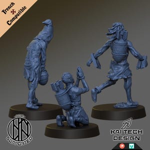 May include: Three gray miniature figures in various poses, each with a unique design. One figure kneels with hands clasped, another stands with a vessel, and the third is in a walking pose. The figures are on black bases. Text includes "Trench Compatible" and "Kai Tech Design."
