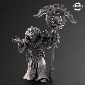 May include: A gray miniature figure of a sorcerer with a brain-like head, intricate armor, and a staff. The figure is in a dynamic pose, with one arm outstretched and the other holding the staff. The staff has a cage-like design with a sphere in the center.