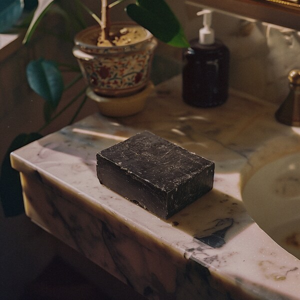 eco-friendly ORGANIC charcoal and tea tree soap. fair trade, cruelty free