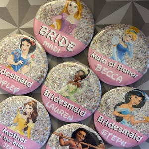 May include: A handmade wooden sign with the text "Welcome to our home" in a handwritten style. The sign is painted white with a distressed finish and a dark brown border. A small, decorative heart is attached to the bottom.