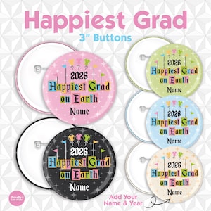 May include: A collection of 3-inch graduation buttons in various colors, including pink, green, blue, and black. Each button features the text "Happiest Grad on Earth" with the year 2026 and space for a name. The buttons have a pin back.