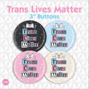 May include: Four 3-inch round buttons with the text "Trans Lives Matter." The buttons have different background colors: black, light blue, pink, and cream. Each button features the text in a block design with pink and blue accents.