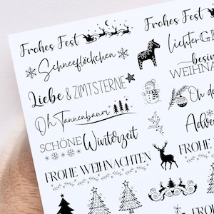 Detailaufnahme der Kerzentattoo PDF Vorlage Weihnachten mit Motiven wie Frohes Fest, Schöne Winterzeit, Oh Tannenbaum, Frohe Weihnachten