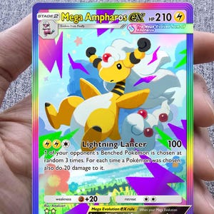 May include: A Mega Ampharos EX Pokémon card featuring a yellow and white creature with a lightning bolt design. The card has a holographic background with text that reads "Lightning Lancer" and "HP 210".