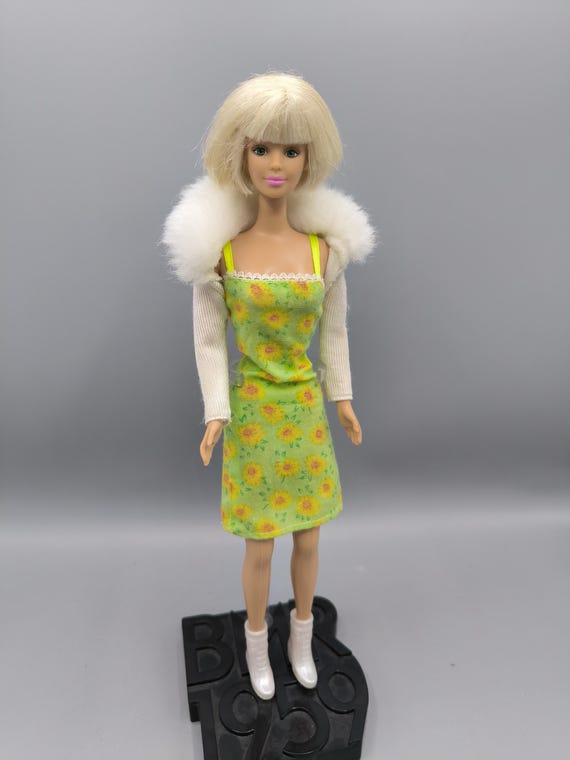 vintage barbie green dress Vintage Barbie in green dress with sunflowers, Barbie with a bob hairstyle,  Bob Mackie face mold