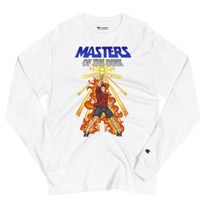 May include: White long-sleeve t-shirt with a graphic of a person playing tennis in a fiery halo. The text "MASTERS OF THE DINK" is above the graphic.