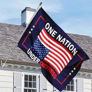 May include: A blue flag with a white border and stars in the corners. The flag has a red, white, and blue American flag design in the center with the text "ONE NATION UNDER DISTRESS" in white.