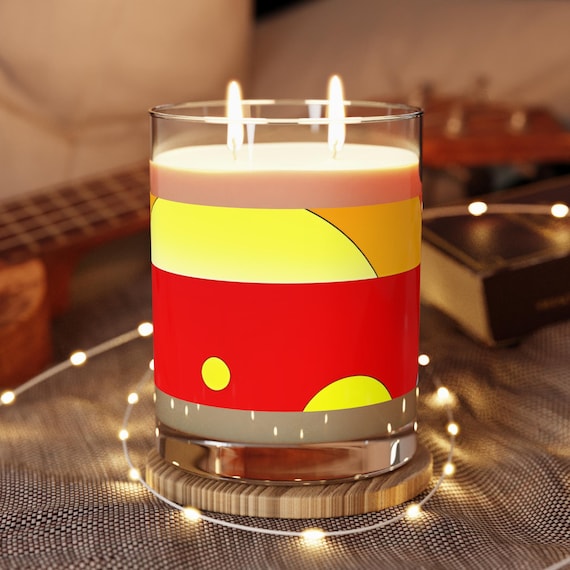 Modern scented candle – Abstract design in red and yellow for stylish decoration