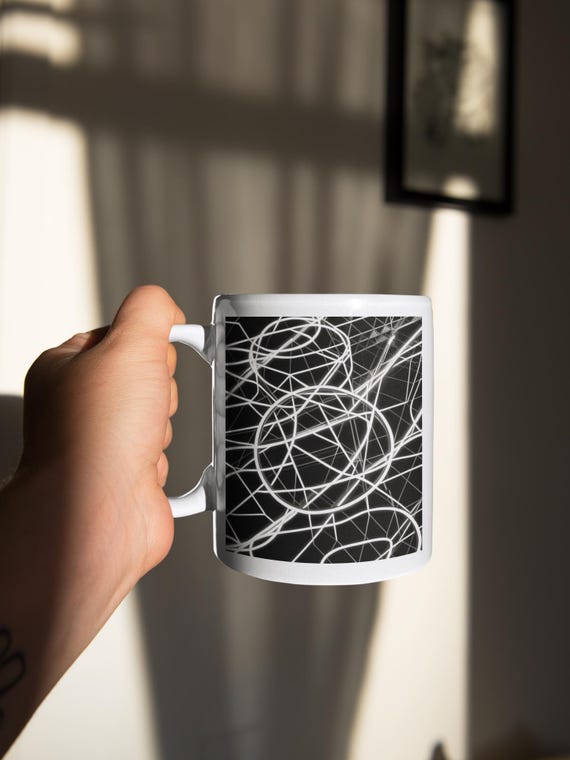 Black and white mug – abstract design for stylish coffee breaks