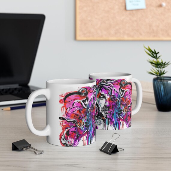 Artistic coffee mug with abstract portrait in pink and purple