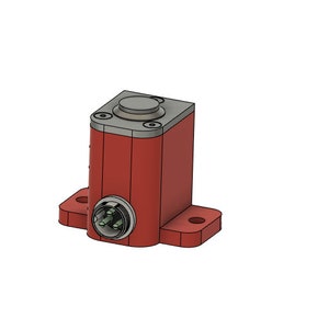 May include: A red rectangular industrial component with a silver top and a circular connector. The component has two mounting flanges with holes. The design is a 3D rendering.