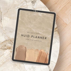 May include: A digital tablet displaying a planner titled "Huid Planner" with the text "Bellezza Avanti" above it. The planner's cover features a marble-like background and three swatches of beige, tan, and brown paint. The tablet is on a marble table.