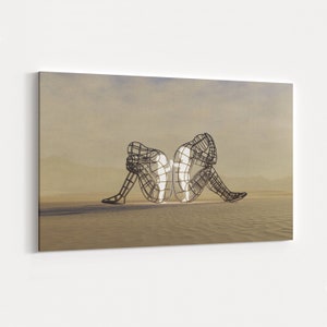 May include: Two abstract metal sculptures of people sitting back to back, facing opposite directions. The sculptures are made of thin metal rods and are illuminated from within, creating a glowing effect.