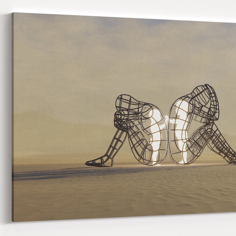 May include: Two abstract metal sculptures of people sitting back to back, with their heads bowed. The sculptures are made of thin metal rods and are illuminated from within, creating a glowing effect.